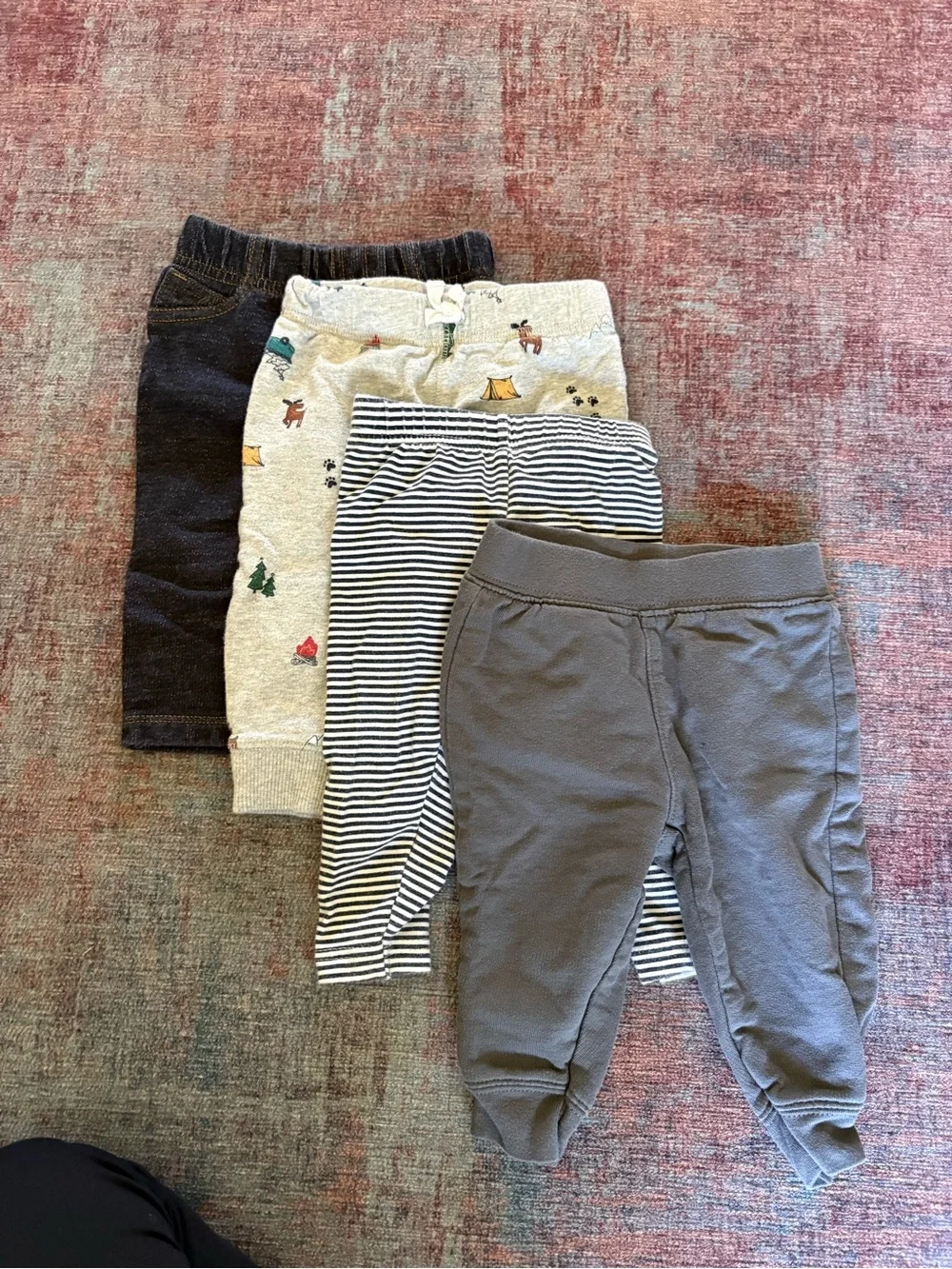 4 pairs of 6 month size pants